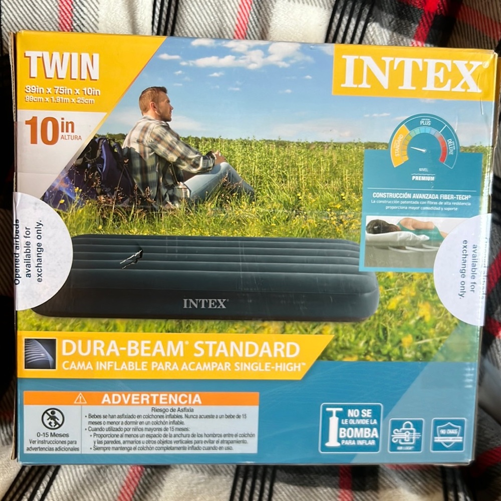 Intex twin size air mattress. Brand new in box, still sealed.